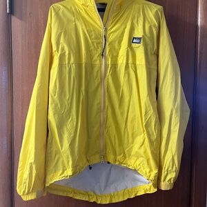 REI bright yellow raincoat (no hood, long in back for rear-end coverage) pockets
